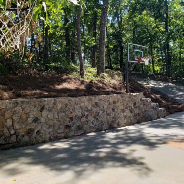 Concrete retaining wall with rock vaneer retaining wall with rock veneer landscaping cumming